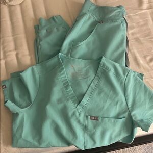 Figs Light teal/Blue Scrub Top and Zamora joggers.